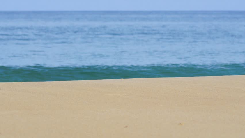 Blurr sand texture on sea background.