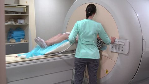 VINNITSA, UKRAINE - May 25, 2017: Doctor makes an MRI to the patient at the hospital.