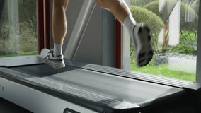 Low angle view of person do running cardio exercise on treadmill, indoor gym - Powered by Shutterstock - Get 15% off with code: PIKWIZARD15
