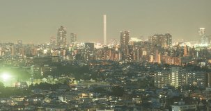 TOKYO, JAPAN – JUNE 2016 : Timelapse of central Tokyo cityscape with Nakano area in view at night