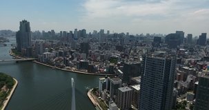 TOKYO, JAPAN – JUNE 2016 : Aerial shot of Tokyo Harbour area and central cityscape on a beautiful day
