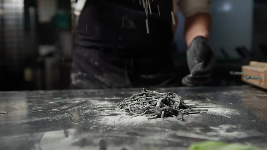 Chef Flours Spaghetti Black Cuttlefish Ink At Guitar Frame Cooking Italian Dish