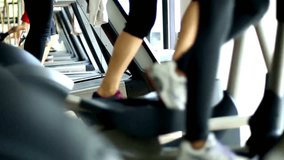 Dynamic Gym Session: 4K Group Workout on Steppers and Treadmills