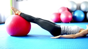 Core Strength: 4K Closeup of Blond Woman Doing Abs with Pilates Ball