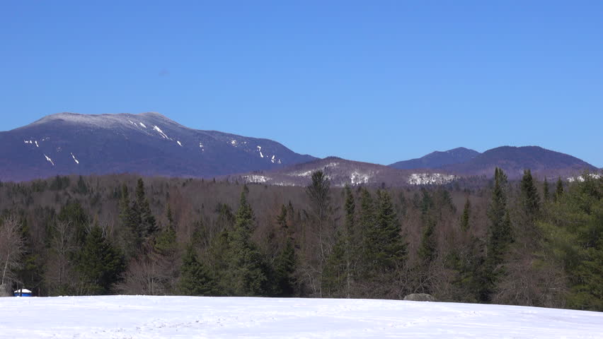 Snow capped mountain peaks in the Adirondack mountains.