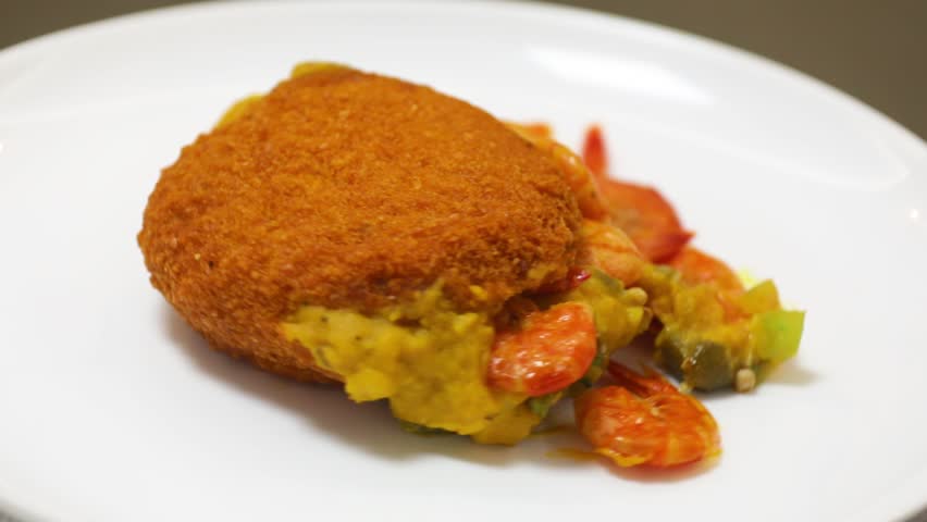 Traditional Brazilian acarajé, food of African origin based on vatapá, caruru and dry shrimp . Video