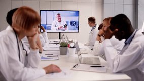 Bored Unmotivated Doctor Group In Video Conference Presentation