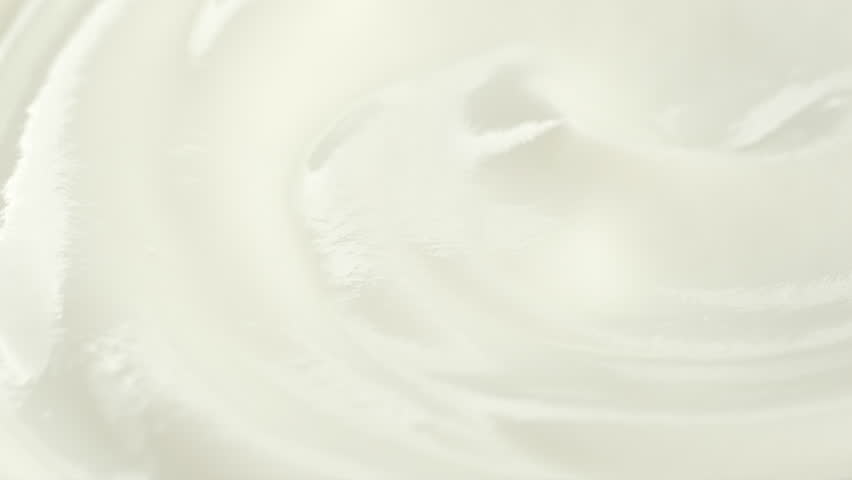 Zoom frame sour cream, fresh greek yogurt close up