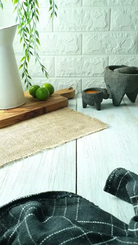 Serving Suadero Tacos. Fried chopped meat in a mini corn tortilla. Street food from CDMX, Mexico, traditionally accompanied with cilantro, onion and spicy red sauce.