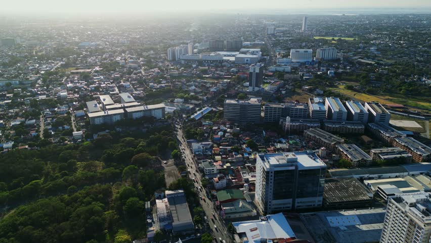 Panoramic View Of Cityscape Road Traffic In Alabang, Las Piñas, Metro Manila, Philippines - Drone Shot