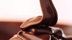 Super Slow Motion Shot of Rippling Melted Caramel Super Slow Motion Shot of Salted Caramel Explosion Towards Camera Isolated on Black Dripping caramel drops of sweet caramel sauce.  - Powered by Shutterstock - Get 15% off with code: PIKWIZARD15