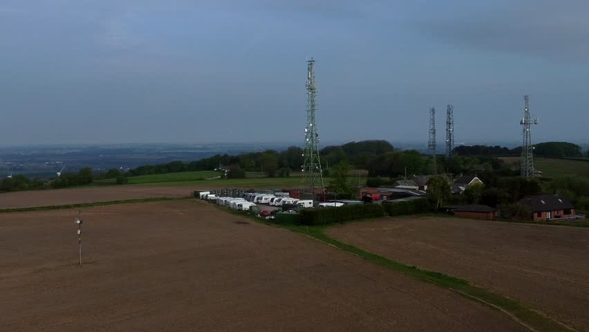 Billinge hill transmitter antenna towers aerial view towards caravan storage on top of Crank landmark overlooking St Helens countryside