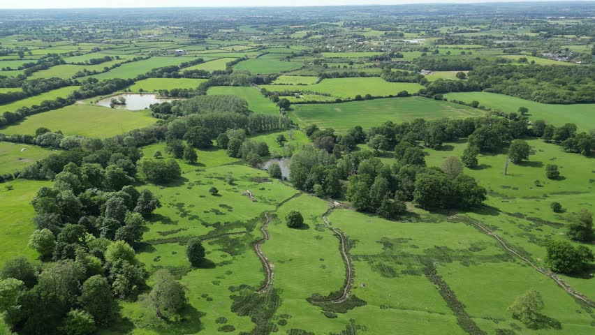360 degrees slowly rotating drone view of the Weald of Kent, around the village of Boughton Monchelsea near Maidstone. May, Kent, UK