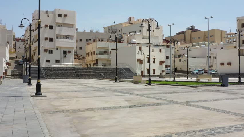 pigeons flying on the floor of the ancient Medina Streets in the Kingdom of Saudi Arabia
