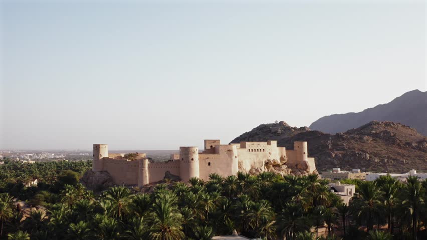 Nakhal Fort in Nakhal Oman is a historic fortress set against the backdrop of the Hajar Mountains Renowned for its pre-Islamic architecture, this fort offers panoramic views and a glimpse into heritag