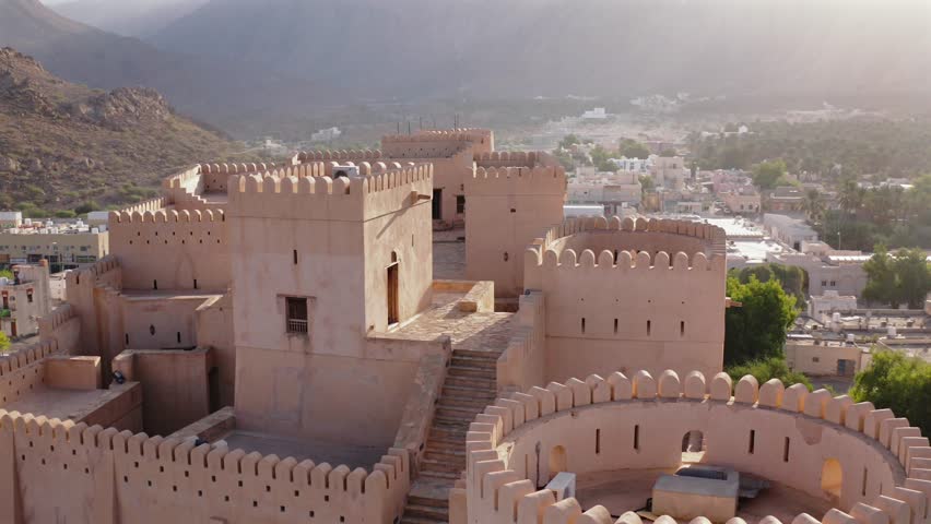 Nakhal Fort in Nakhal Oman is a historic fortress set against the backdrop of the Hajar Mountains Renowned for its pre-Islamic architecture, this fort offers panoramic views and a glimpse into heritag