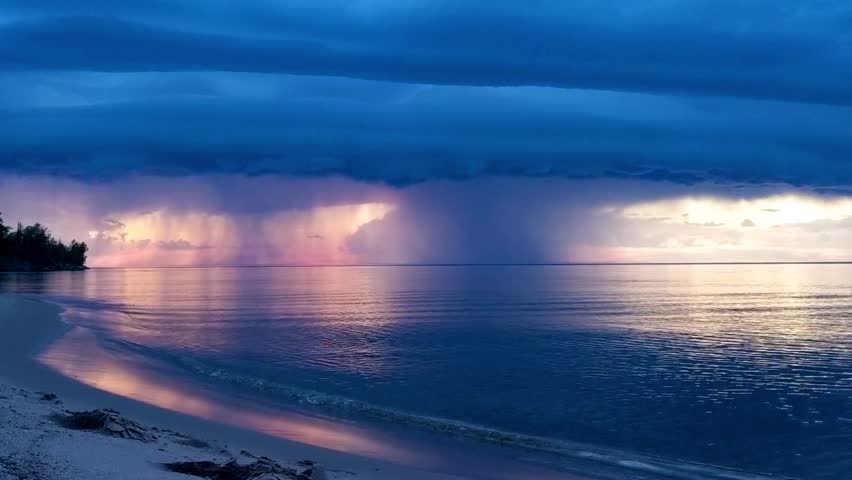 Rainstorm at sunset over Lake Superior in upper Michigan