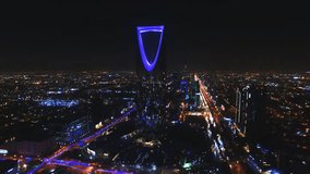 Riyadh, Saudi Arabia, Kingdom Center or Burj Al Mamlaka (night aerial view) - Powered by Shutterstock - Get 15% off with code: PIKWIZARD15