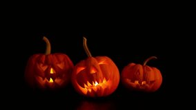 Creepy Halloween night with a spooky pumpkin and misty graveyard. Eerie silhouette of a haunted tree against a dark background. Concept of horror and - Powered by Shutterstock - Get 15% off with code: PIKWIZARD15