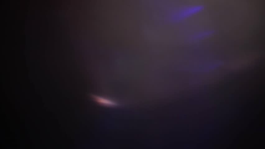 Light organic leaks effect background animation stock footage. Lens light leaks flashing around making an elegant abstract background animation. Classic Light Leak in 4k