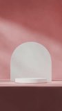 3d video render scene mockup of minimal white cylinder shape podium seamless loop shadow animation with pink wall background
