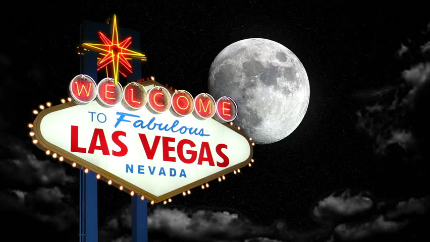 A stylized look at the Las Vegas welcome sign at night with time lapse clouds