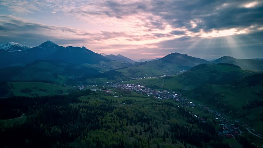 Aerial Hyperlapse spring mountainous rural landscape at dusk Royalty-Free Stock Footage #3504834365