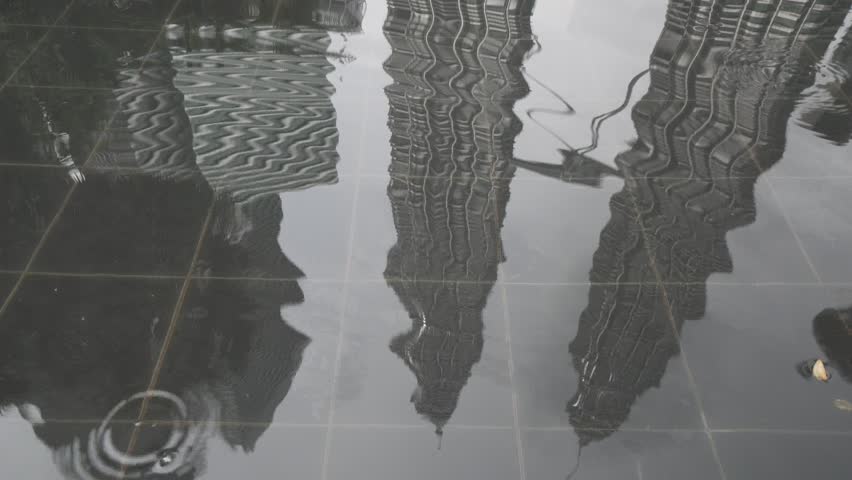 The Petronas Towers , also known as the Petronas Twin Towers and colloquially the KLCC Twin Towers