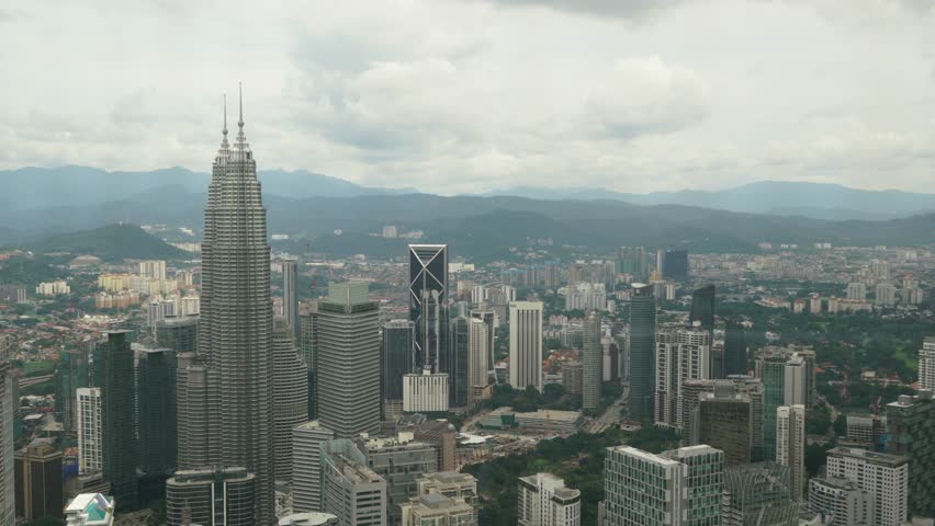 The Petronas Towers , also known as the Petronas Twin Towers and colloquially the KLCC Twin Towers