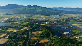 Aerial drone view of the spectacular landscape of Garden City lined with rice fields. - Powered by Shutterstock - Get 15% off with code: PIKWIZARD15