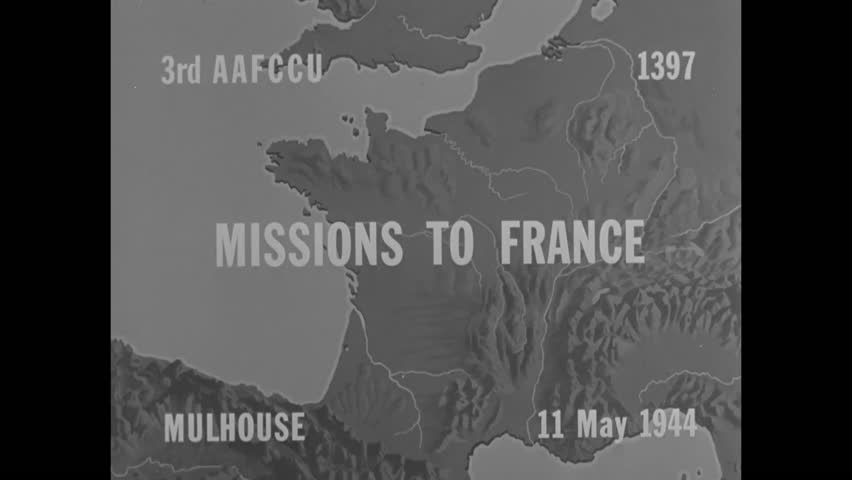 CIRCA - 1944 - A camera strapped to a US bomber captures the action as freight yards in Mulhouse, France are bombed.