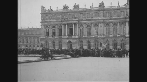 CIRCA - 1919 - Crowds gather at Versailles, France for the signing of the Treaty of Versailles.