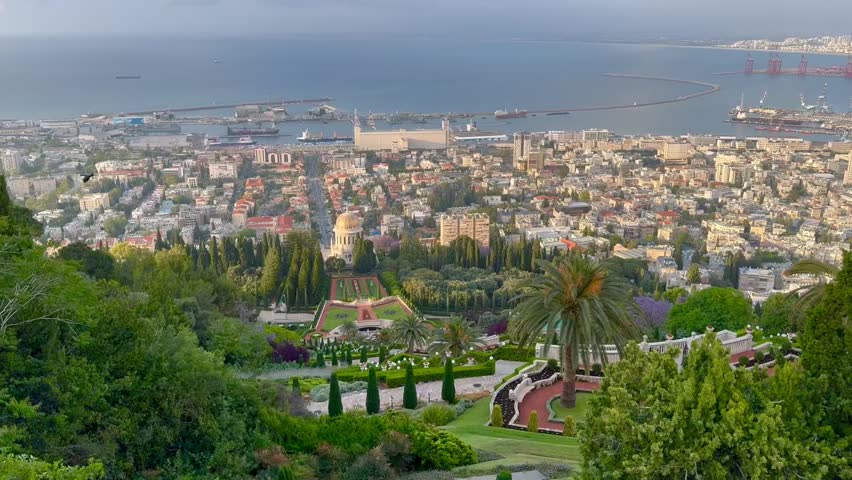 Haifa, Israel, June 26, 2024 : view from the Louis Promenade on Mount Carmel to the Bahai Temple, the downtown and port of Haifa city