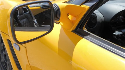 bologna,italy,01/01/2018:yellow sports car interior lotus elise
