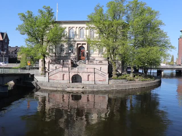 In the center of Stockholm. People go to and from work.