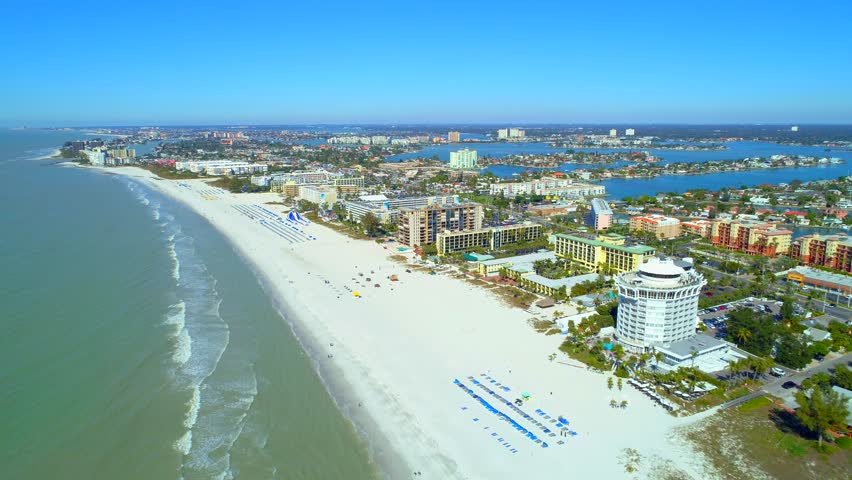 Aerial drone video beachfront resorts and condominiums St Petersburg Beach FL 4k