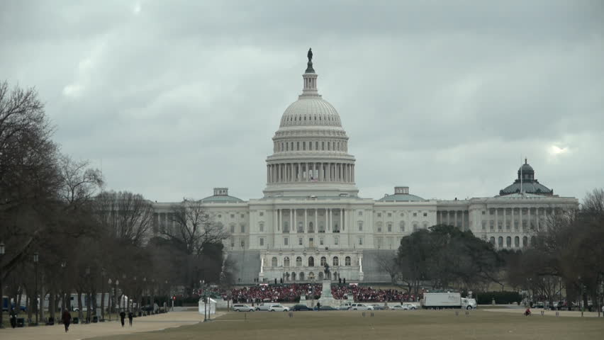 WASHINGTON DC - MARCH 3: Participants in the 100th anniversary of Washington’s Women’s Suffrage Parade rally at steps of the US Capitol March 3, 2013 in Washington DC, USA