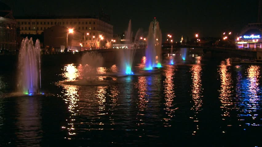 Glowing car bridge in Moscow at night. Beautiful views of capital of Russia. Bright colorful streets and city Lights. Amazing embankment.