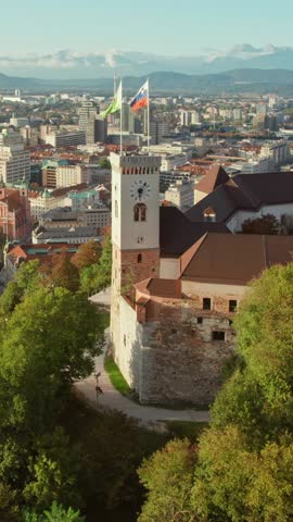 Aerial view of the Ljubljana old town, Slovenia. Ljubljana castle, historic buildings and famous Triple Bridge over the Ljubljanica river in Slovenian capital. 