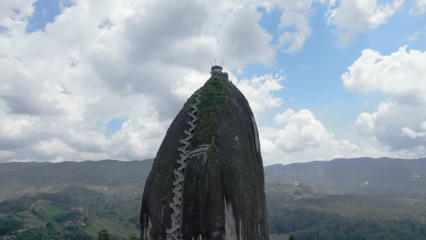 Tilt up shot of La Piedra del Peñol Guatapé Rock.