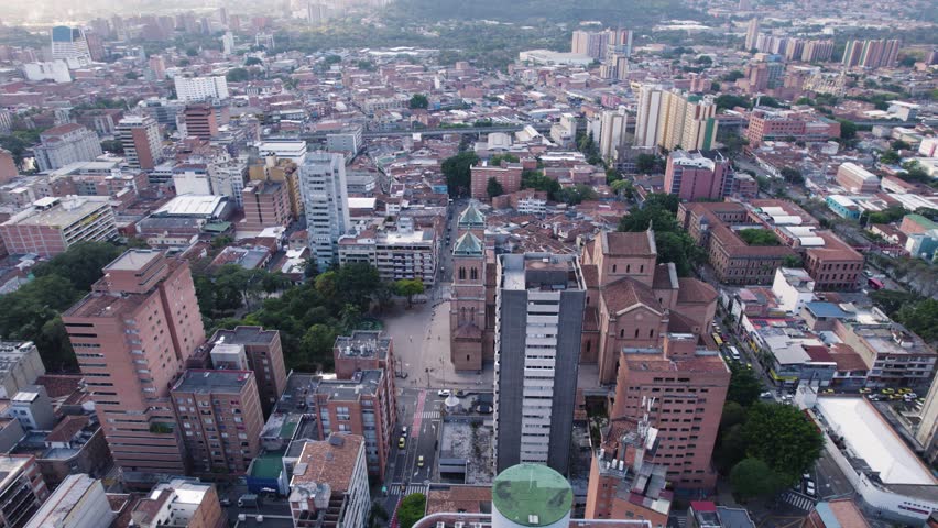 Dawn breaks over the Metropolitan Cathedral, heart of Medellin, Colombia, Aerial