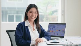 Young adult woman asia people expert tech talent user happy smile looking at camera on AI project SEO visual big data science report center BI smart tools. Office IT worker asian analyst tax audit job - Powered by Shutterstock - Get 15% off with code: PIKWIZARD15