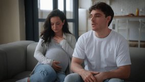 Caucasian family pregnant couple girl guy boyfriend girlfriend sad conflict quarrel at home crisis pregnancy angry husband go away leave wife alone male female misunderstanding man woman problem cry - Powered by Shutterstock - Get 15% off with code: PIKWIZARD15