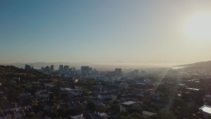 Early morning sunrise drone flying over the skyline of Cape Town South Africa