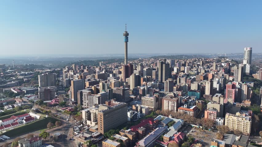Hillbrow Tower At Johannesburg In Gauteng South Africa. High Rise Buildings Landscape. Megacity Background. Johannesburg At Gauteng South Africa. Downtown City. Urban Outdoor Johannesburg South Africa