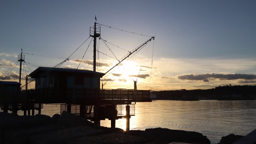 timelapse sunset fishermen