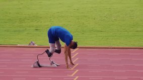 Asian para-athlete with prosthetic blades warms up body in the stadium. Attractive amputee sportsman runner prepare himself before exercise practice session for upcoming running competition - Powered by Shutterstock - Get 15% off with code: PIKWIZARD15