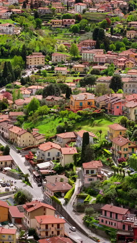 Aerial drone view of the village Bellagio near Lake Como, Italy. Vertical