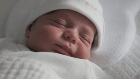 The beautiful 2 week old baby infant is yawning in crib. Close-up portrait	
 - Powered by Shutterstock - Get 15% off with code: PIKWIZARD15