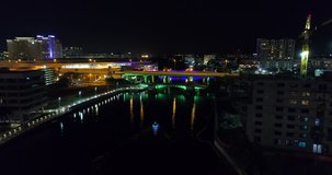 Night aerial video Downtown Tampa Hillsborough river neon bridges